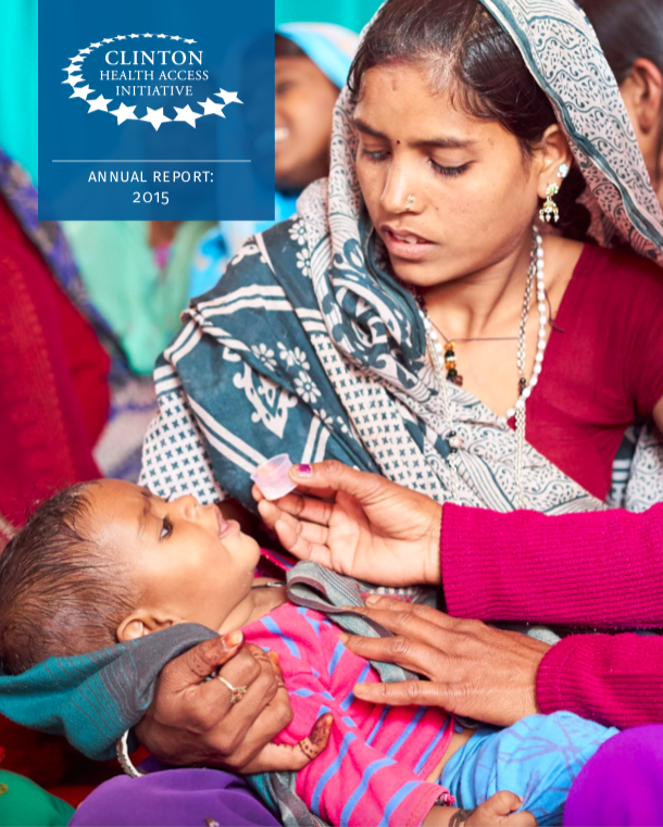 A mother holds a child while he is immunized on the cover of the 2015 Annual Report.