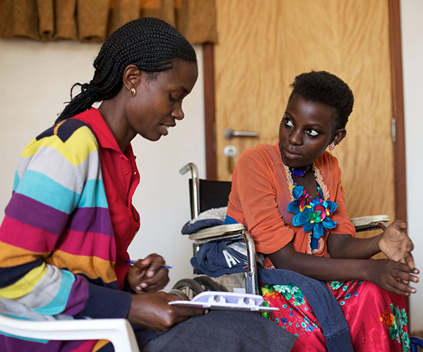 A health worker counsels a patient with cancer. Photo courtesy of the American Cancer Society.