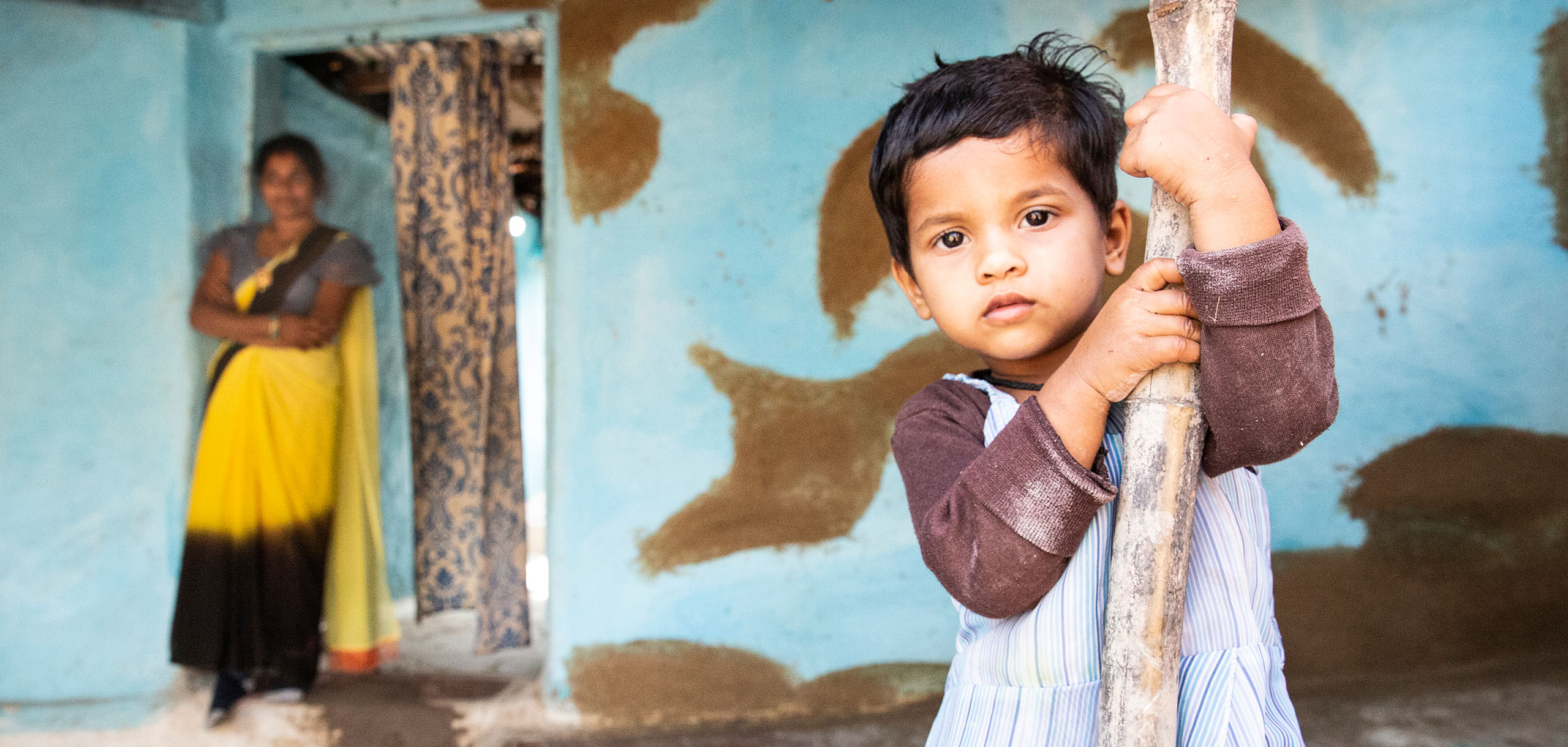 A young Indian child inside their home. Credit Sujata Khanna.